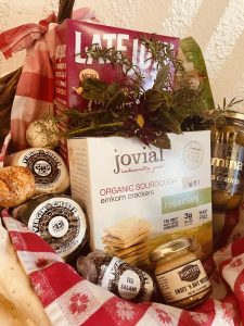 Custom and do-it-yourself gift baskets and party platters feature organic vegan cheese and charcuterie; Clarkdale storefront adds a deli, dessert, and wine section